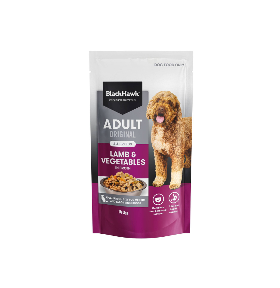 A 140g stand-up pouch of BlackHawk Adult Original Lamb & Vegetables in Broth dog wet food, featuring a brown curly-haired dog on the packaging against a plain white background.
