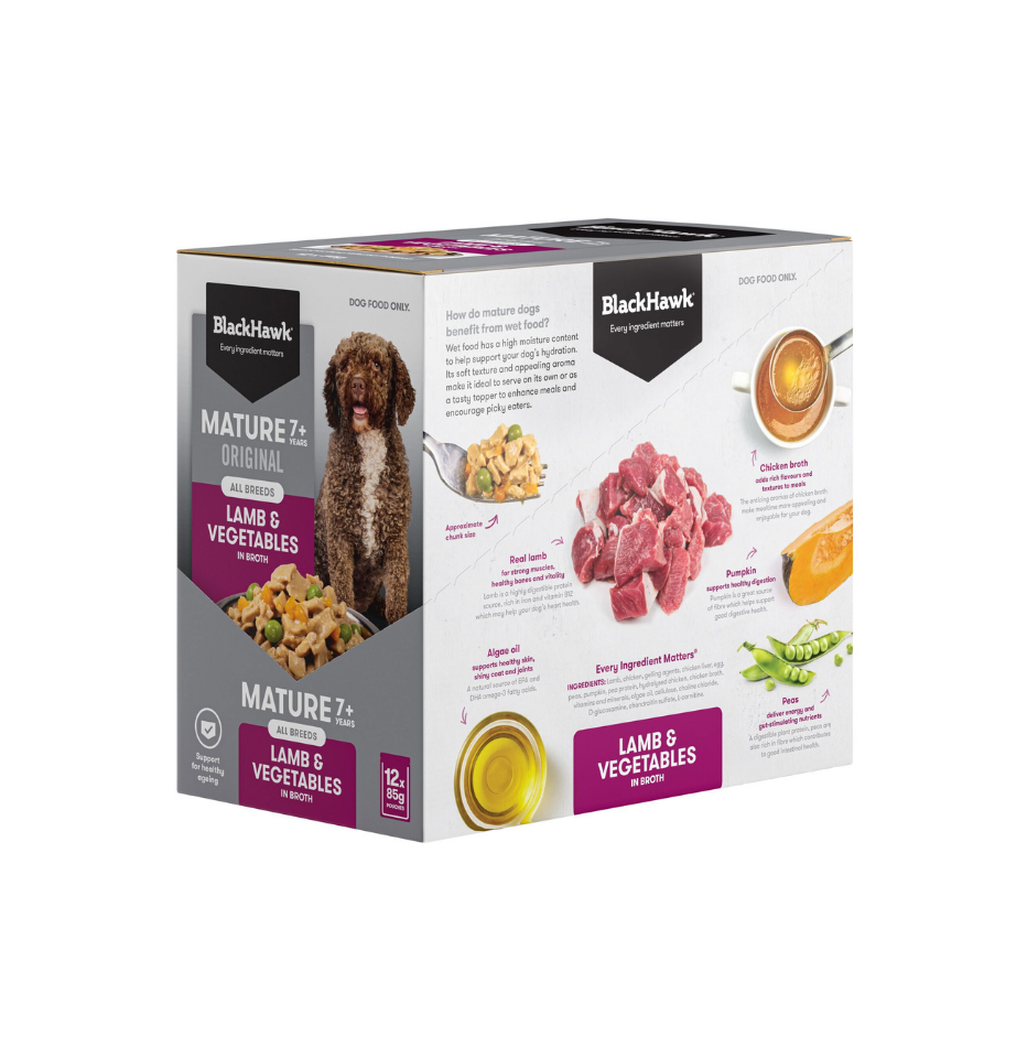 A box of BlackHawk Mature Lamb & Vegetables dog wet food, featuring a white and gray packaging design with purple accents, showing product imagery of lamb meat, vegetables, and a dog on the front and side panels.