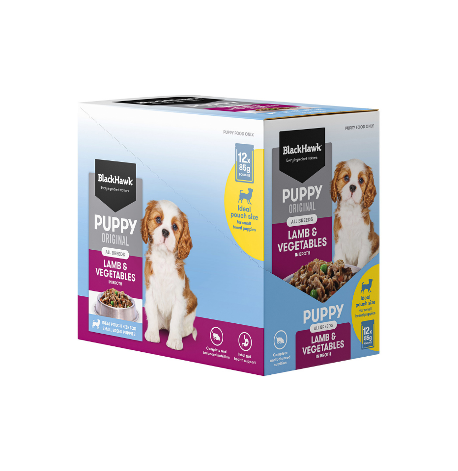 A box of BlackHawk Puppy Original Lamb & Vegetables wet dog food, shown at a three-quarter angle on a plain white background.