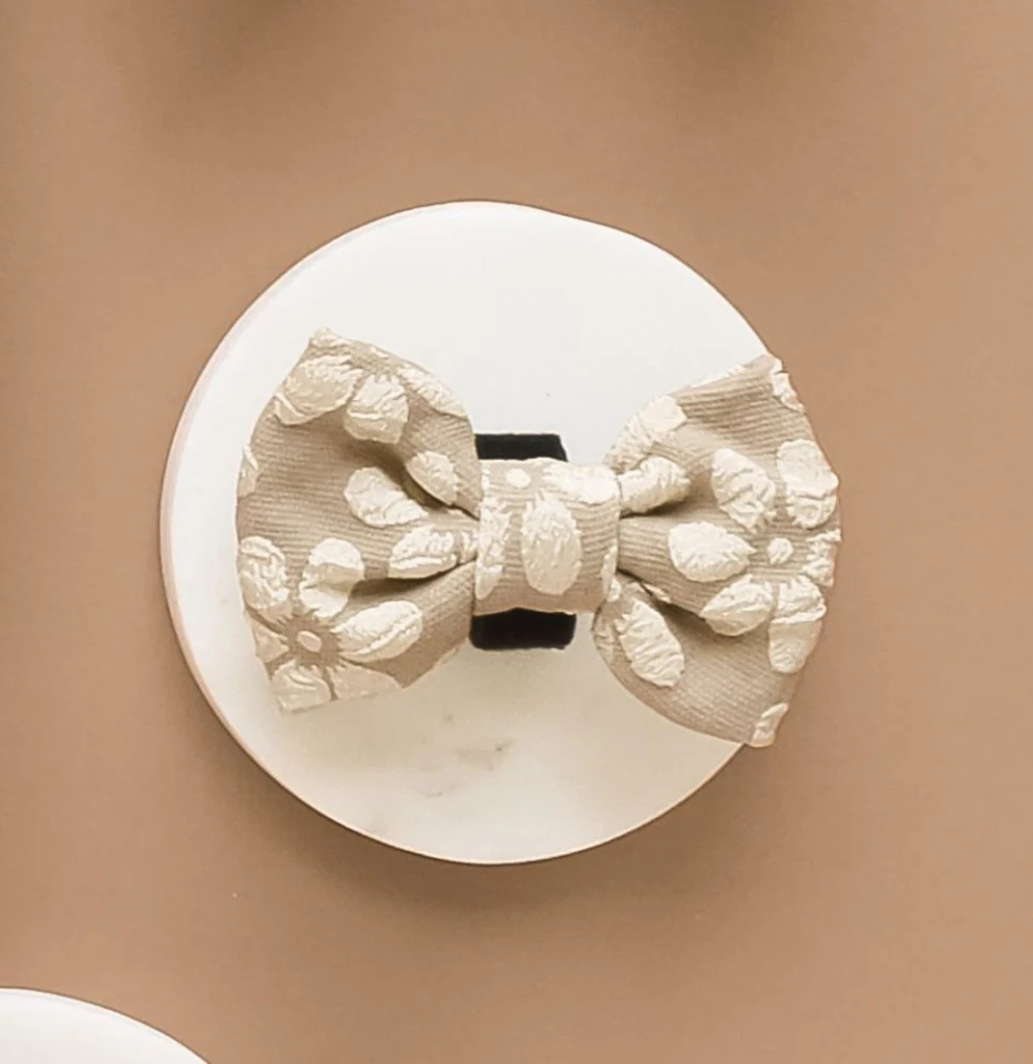 Cocopup London Mocha Flower LUXE Bow Tie on a brown background