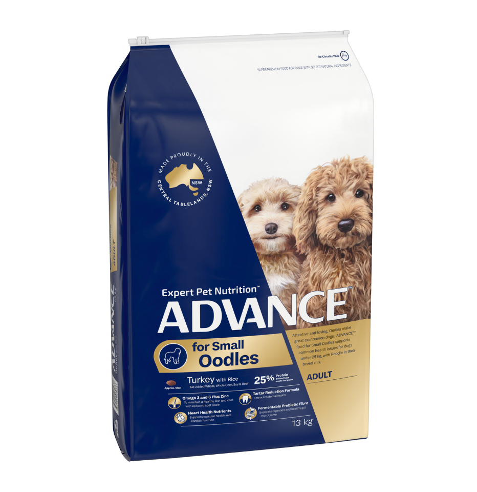 A 13 kg bag of Advance for Small Oodles Adult dog food, featuring a navy blue and white design with a photo of two small dogs on the front.