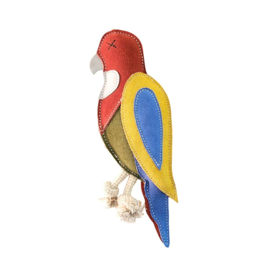 Georgie Paws Rick the Rosella dog toy in buffalo suede with red head, yellow wing, blue tail and olive green body.