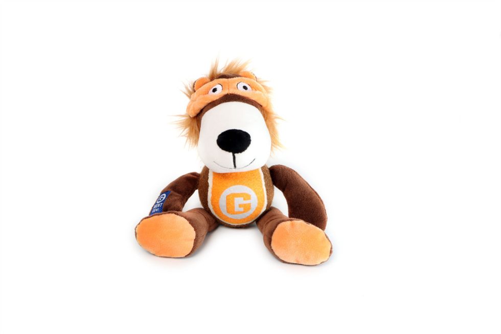 Plush squeaky dog toy lion with a visible brand logo on a white background