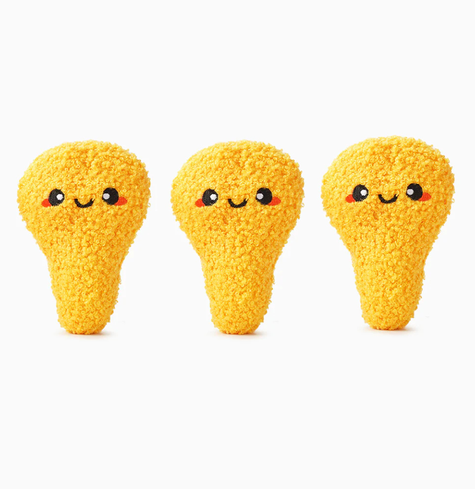 Hugsmart Food Party Fried Chicken dog toy, set of three plush drumsticks on a white background