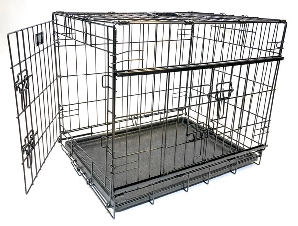 A black metal wire dog crate with an open door and a gray plastic bottom tray, photographed on a plain white background.
