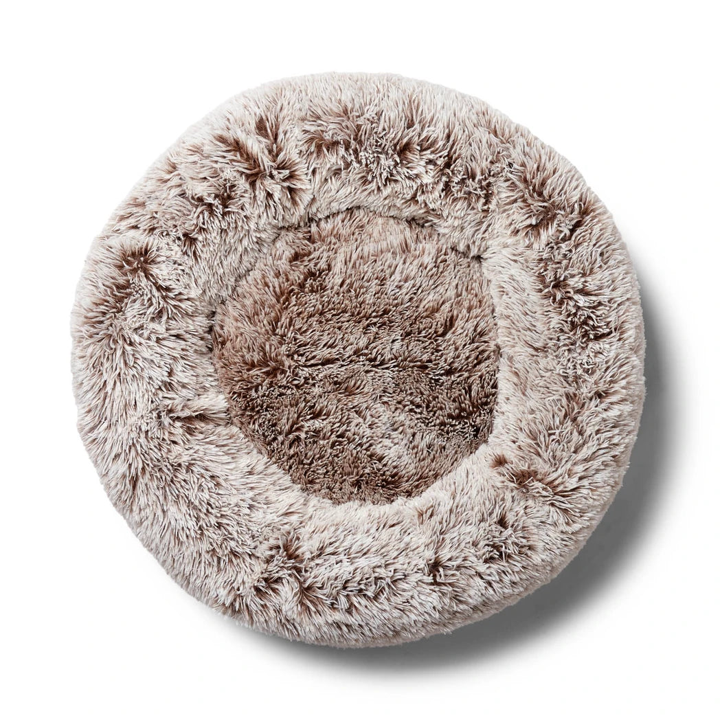 Round fluffy Snooza Calming Dog bed in Mink on a white background