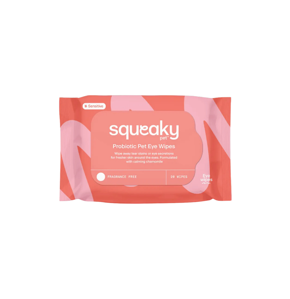 Squeaky Pet Probiotic Dog Eye Wipes for sensitive skin  in a pink and coral-orange resealable pouch, shown on a plain white background.