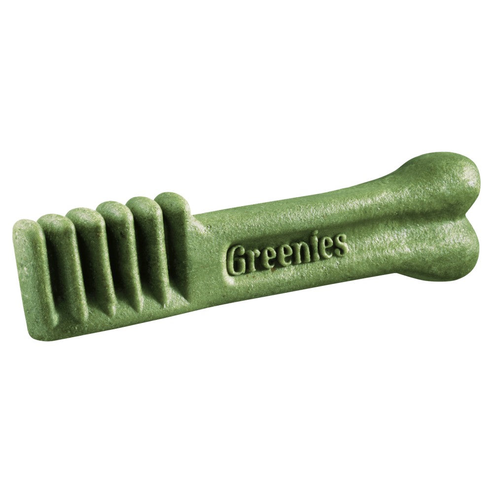 Green dog dental treat with 'Greenies' branding on a white background